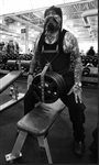 Batso doing his neck curls with 100lb weight